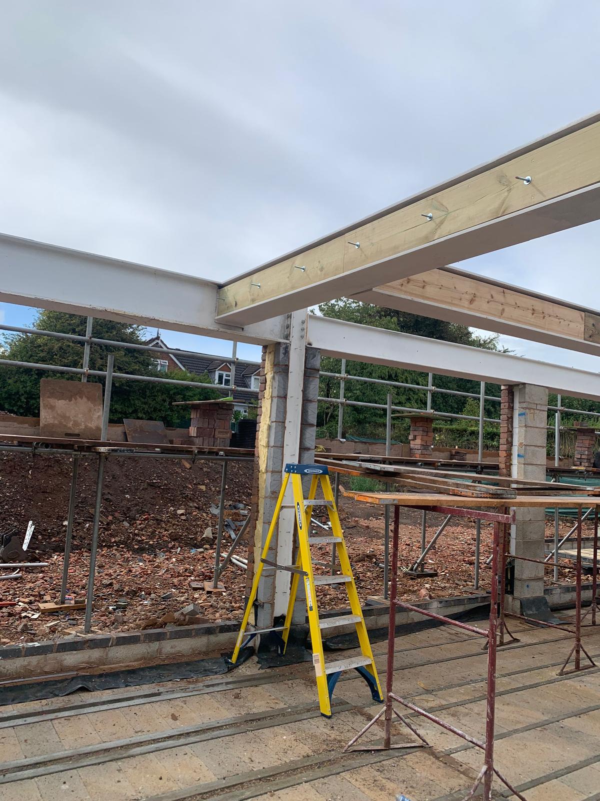 Structural steel beam frame installed to support a residential extension