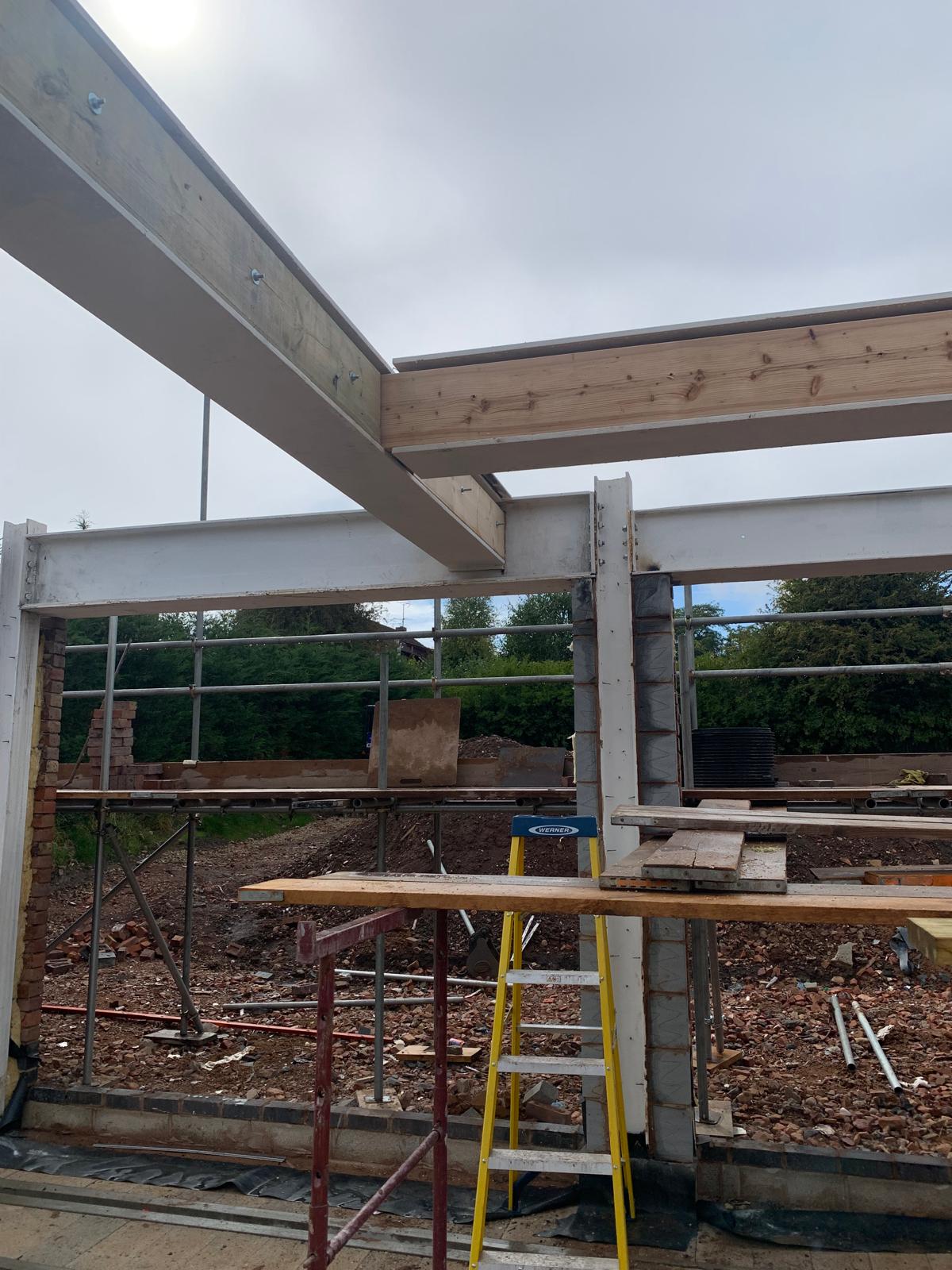Structural steel beam installation for a residential house extension